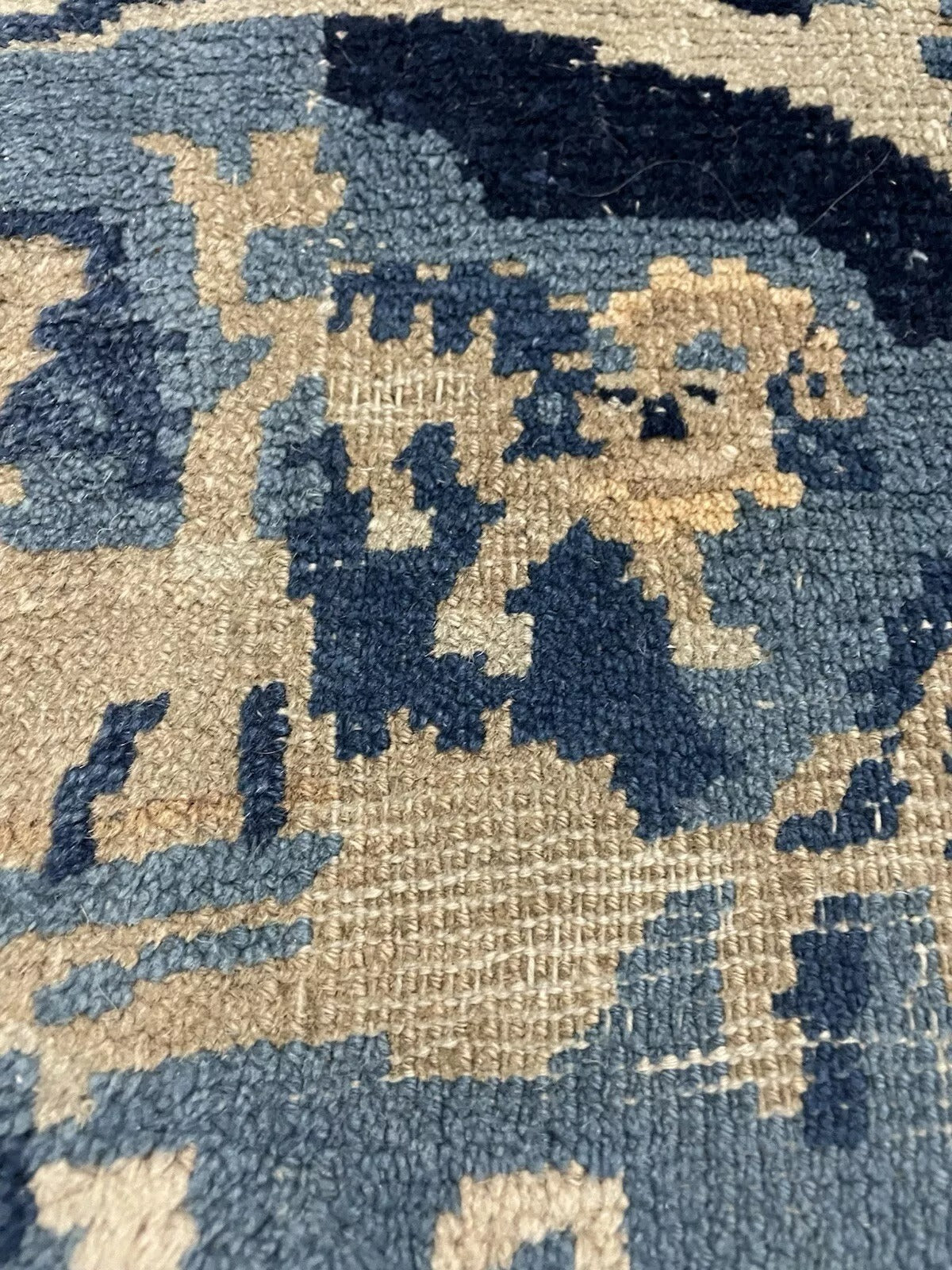 Soft antique palette on Feti rug surface
