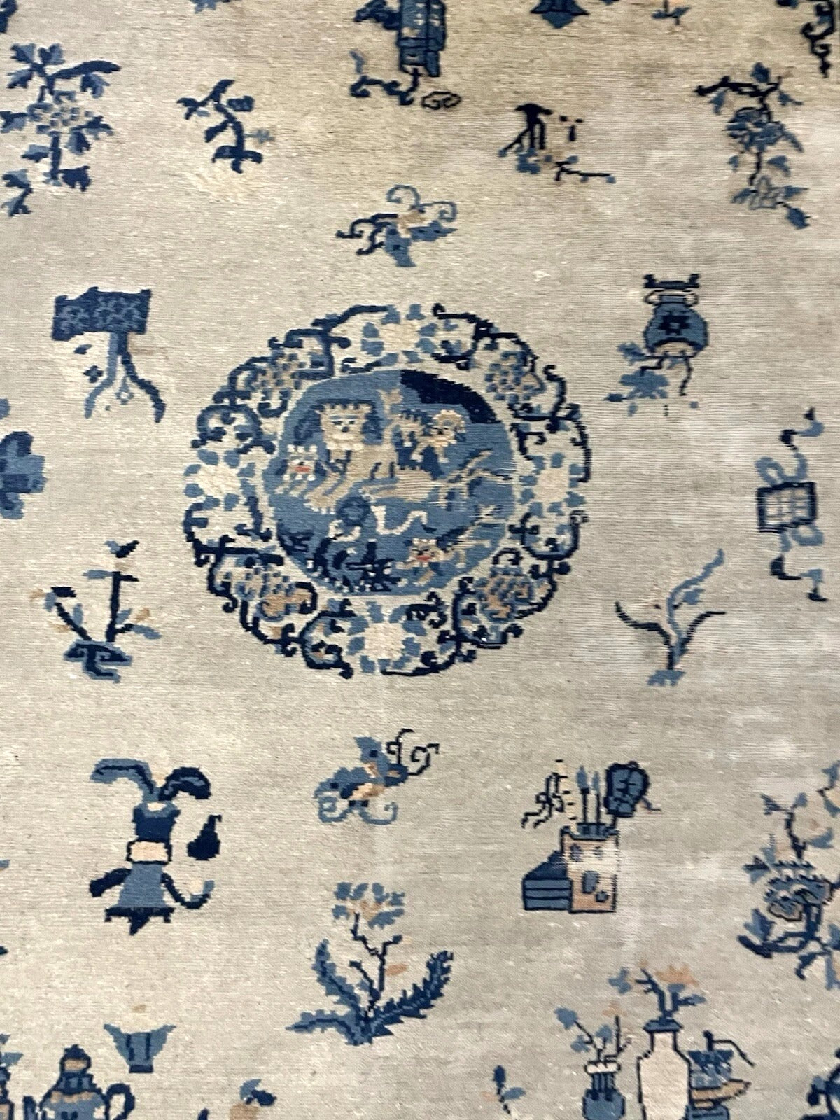 Aged patina and mellow tones in antique rug