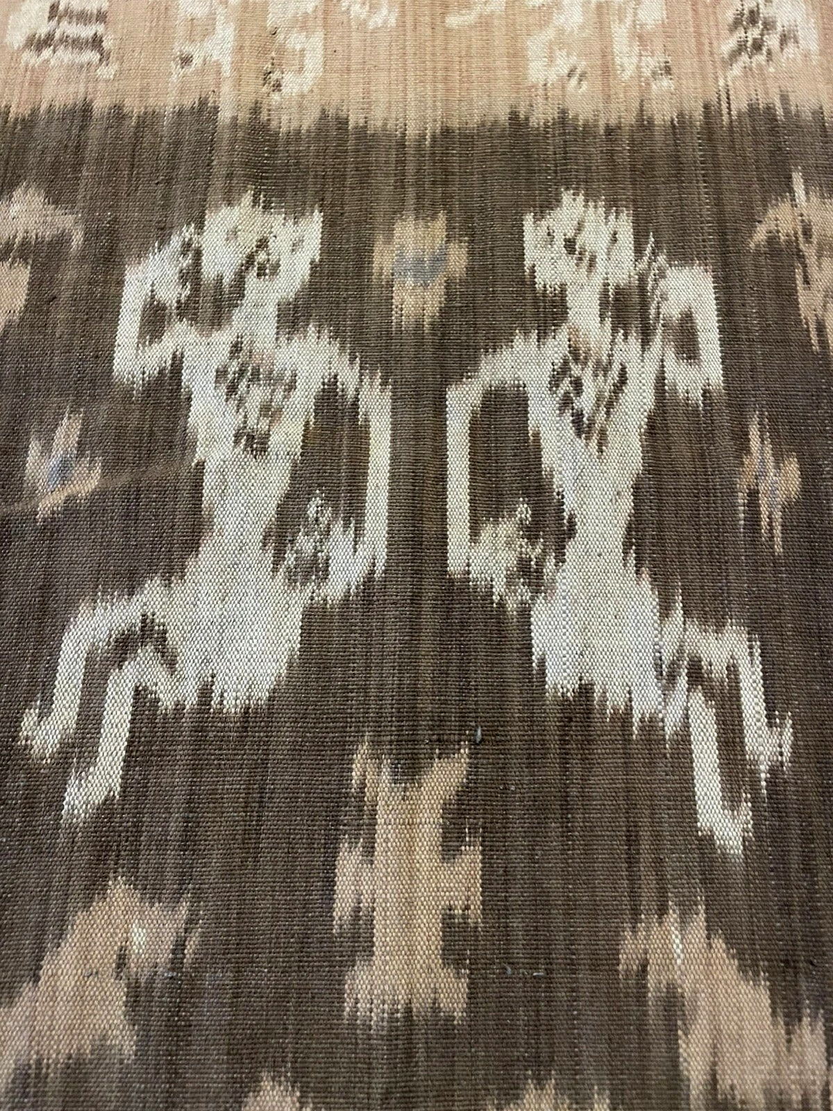 Flat-woven wool texture showing natural tones