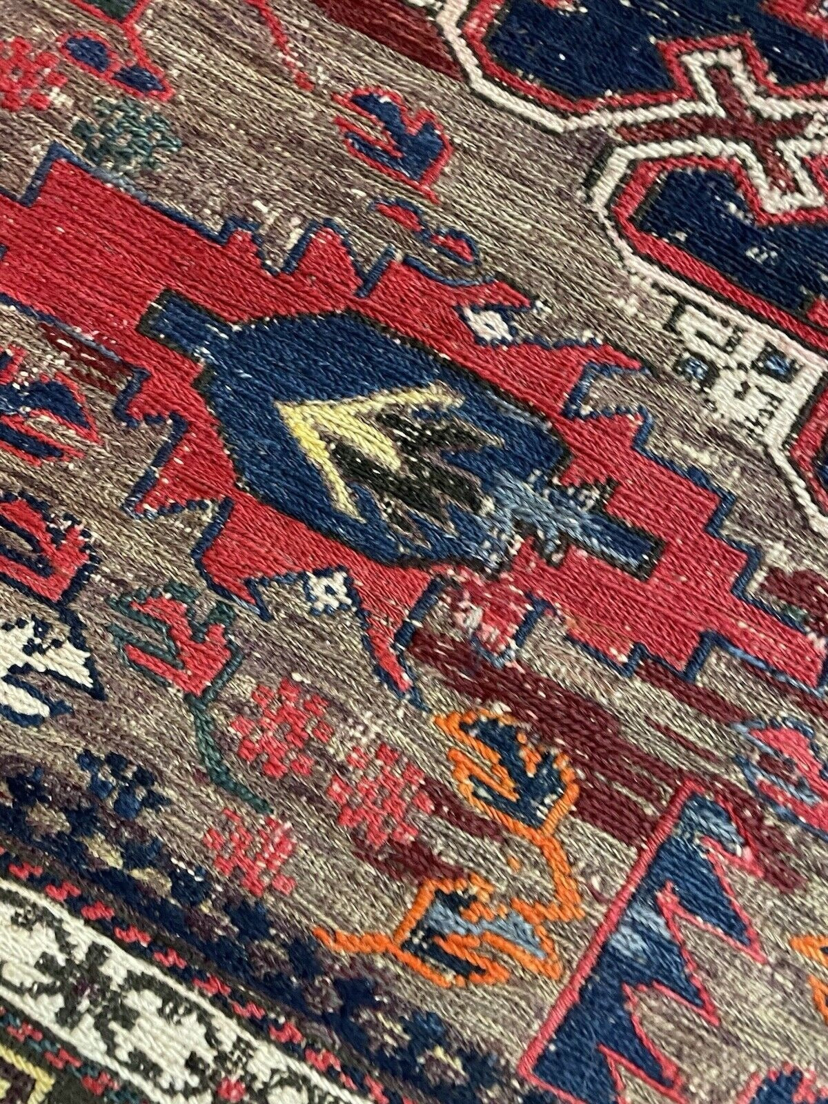 Close macro of yarn weaving in Sumak technique