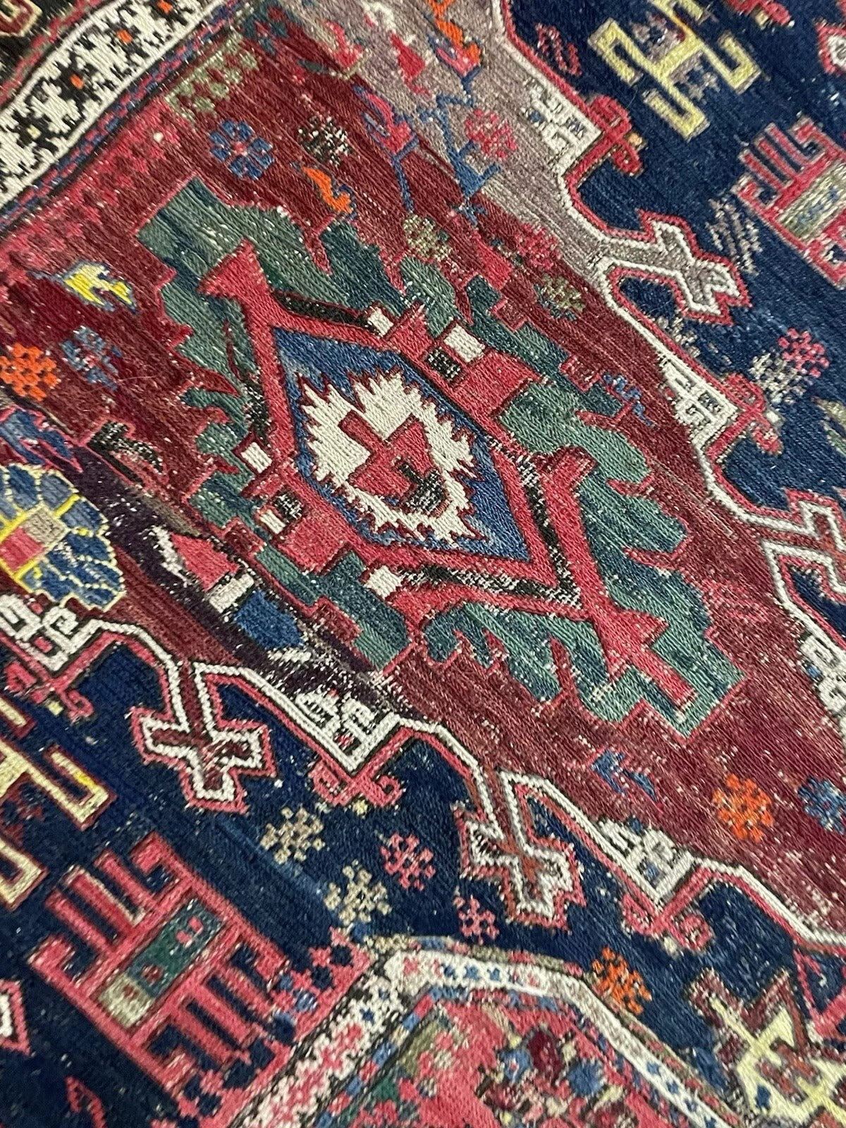 Side angle capturing the rug’s woven structure