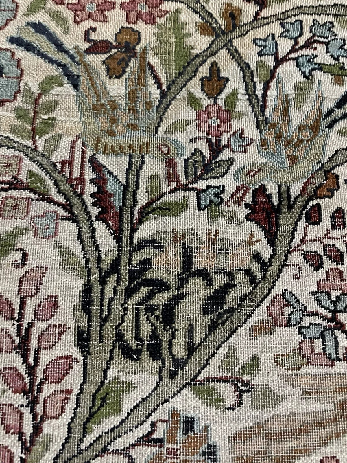 Close-up showcasing the beautifully distressed and muted color palette.