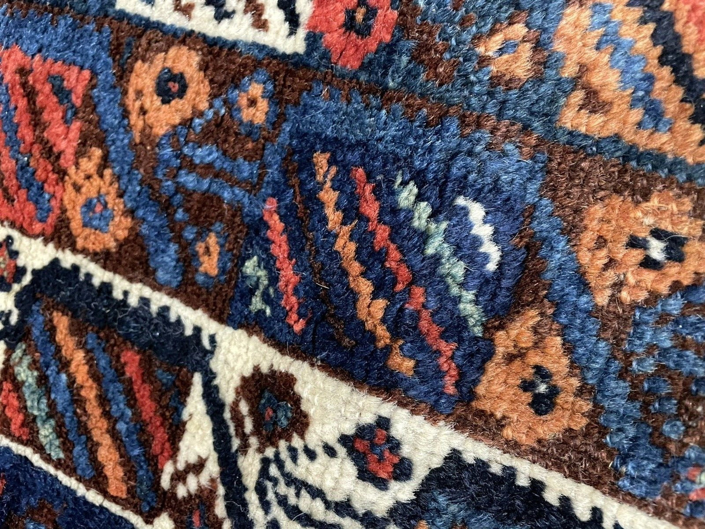 Close-up showing the complex smaller details within each primary square motif.