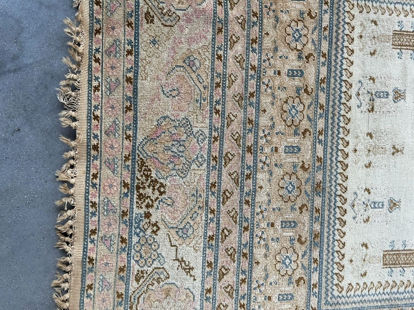Close-up showcasing the intricate knotting details within the central field.
