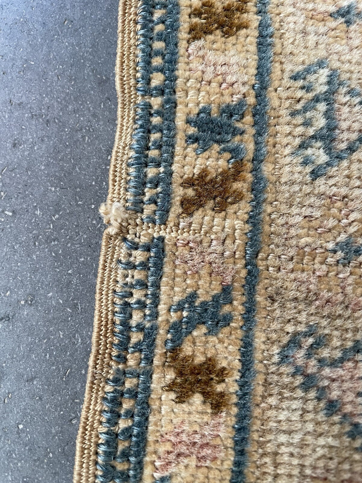 Overall shot capturing the rug's devotional and serene aesthetic.