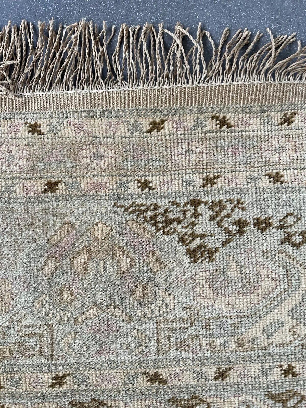 Shot focusing on the intricate floral and geometric patterns in the spandrels.