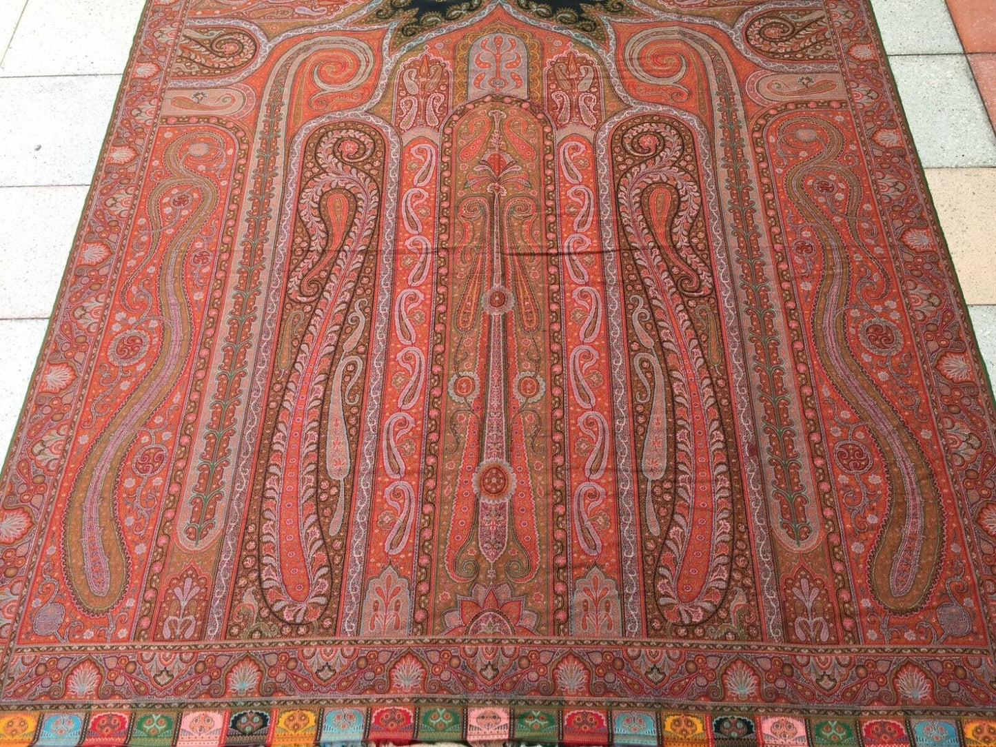 Close-up of the central motif woven into the shawl's design