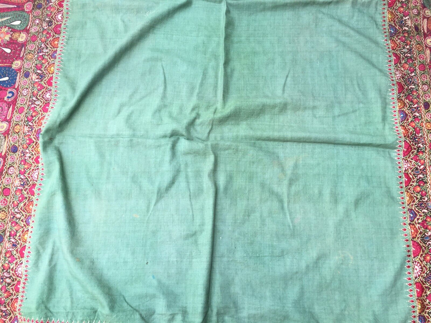 Side angle view of the shawl, highlighting its thickness and luxurious texture