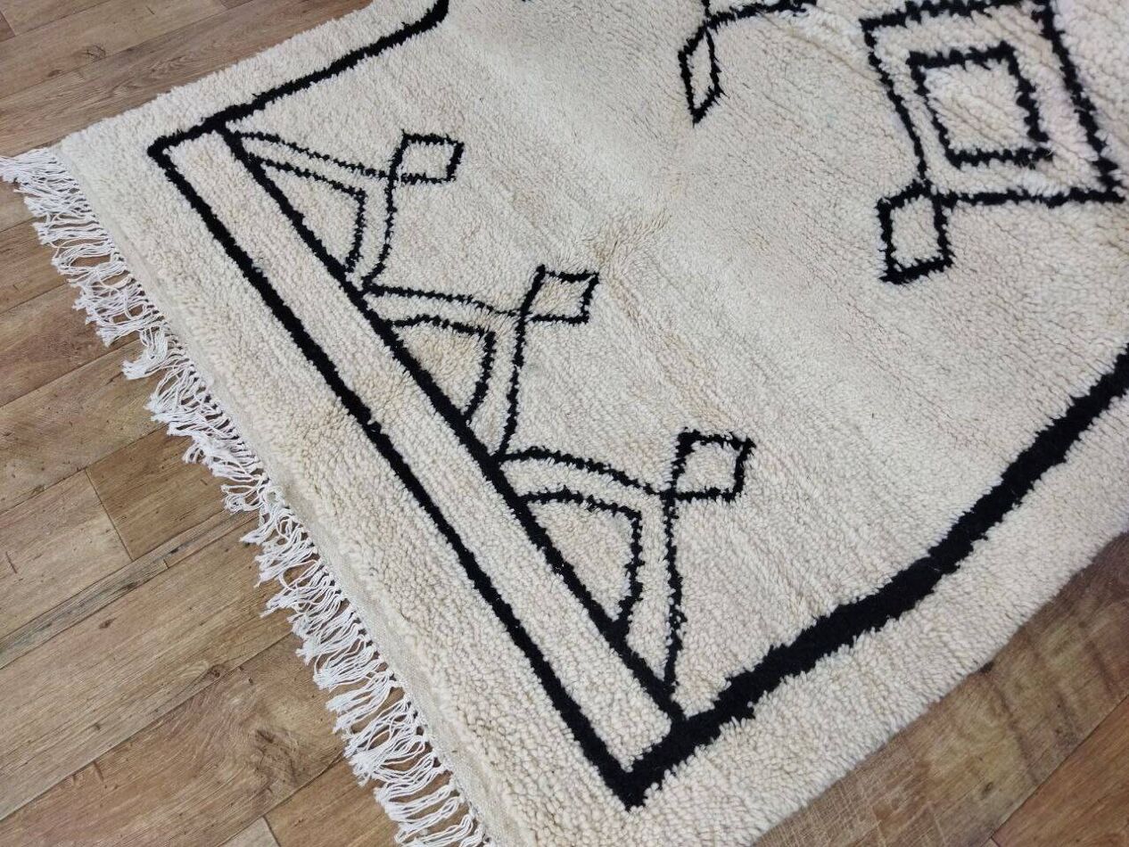 High-resolution view of geometric diamond pattern in rug