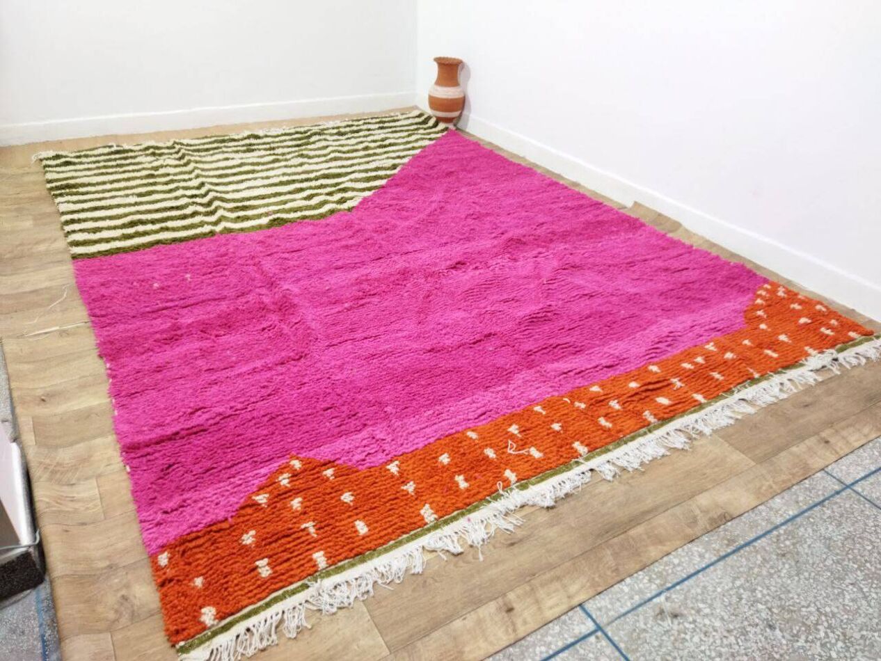 Handwoven wool texture of unspun Berber rug surface