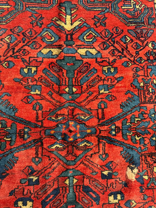 Brick red field with deep indigo medallion outline
