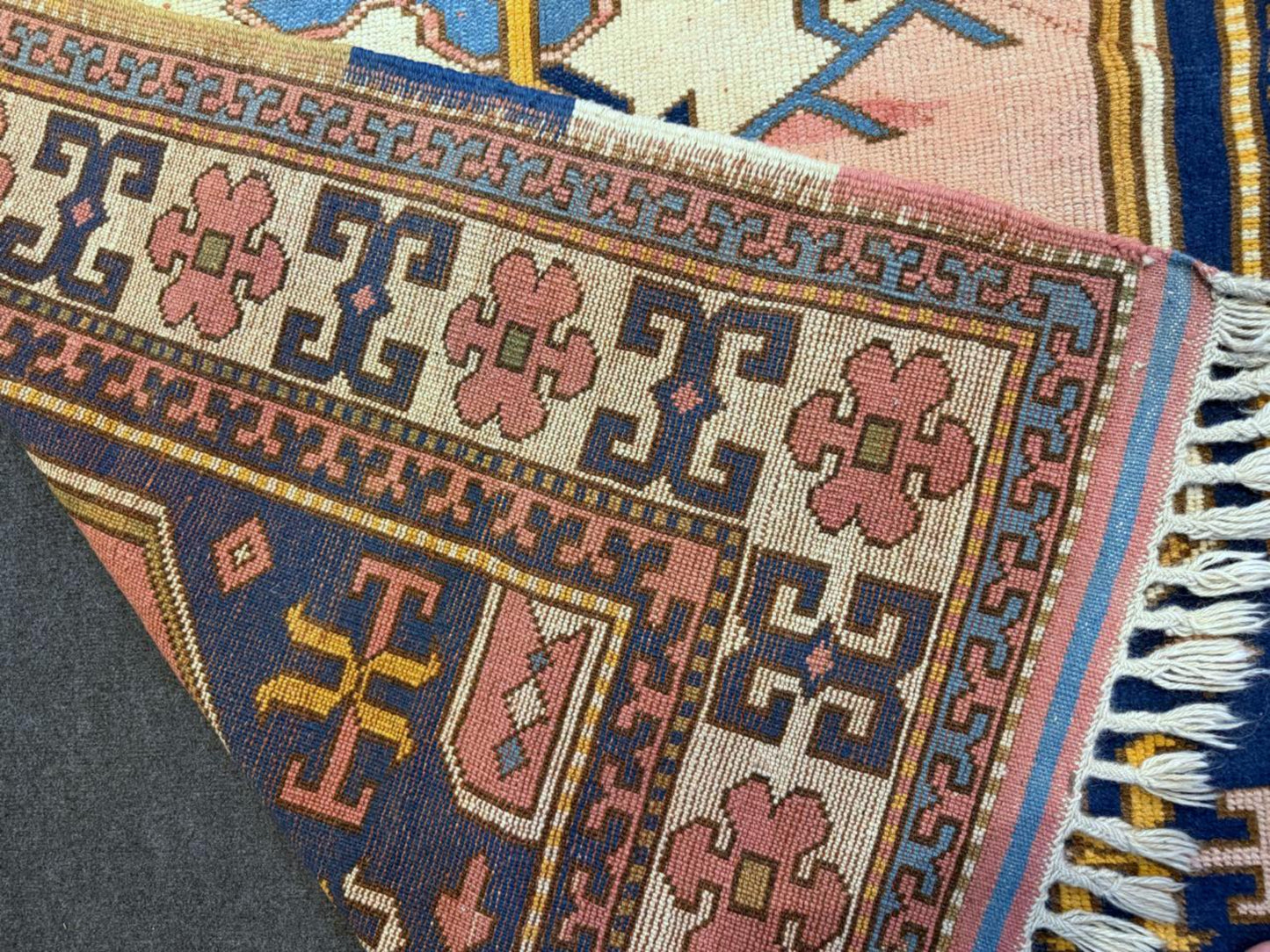 Navy blue elements defining medallion structure