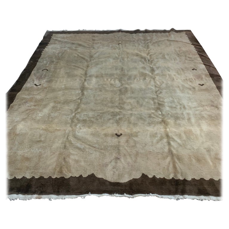Handmade antique Peking Chinese wool rug from the 1900s.