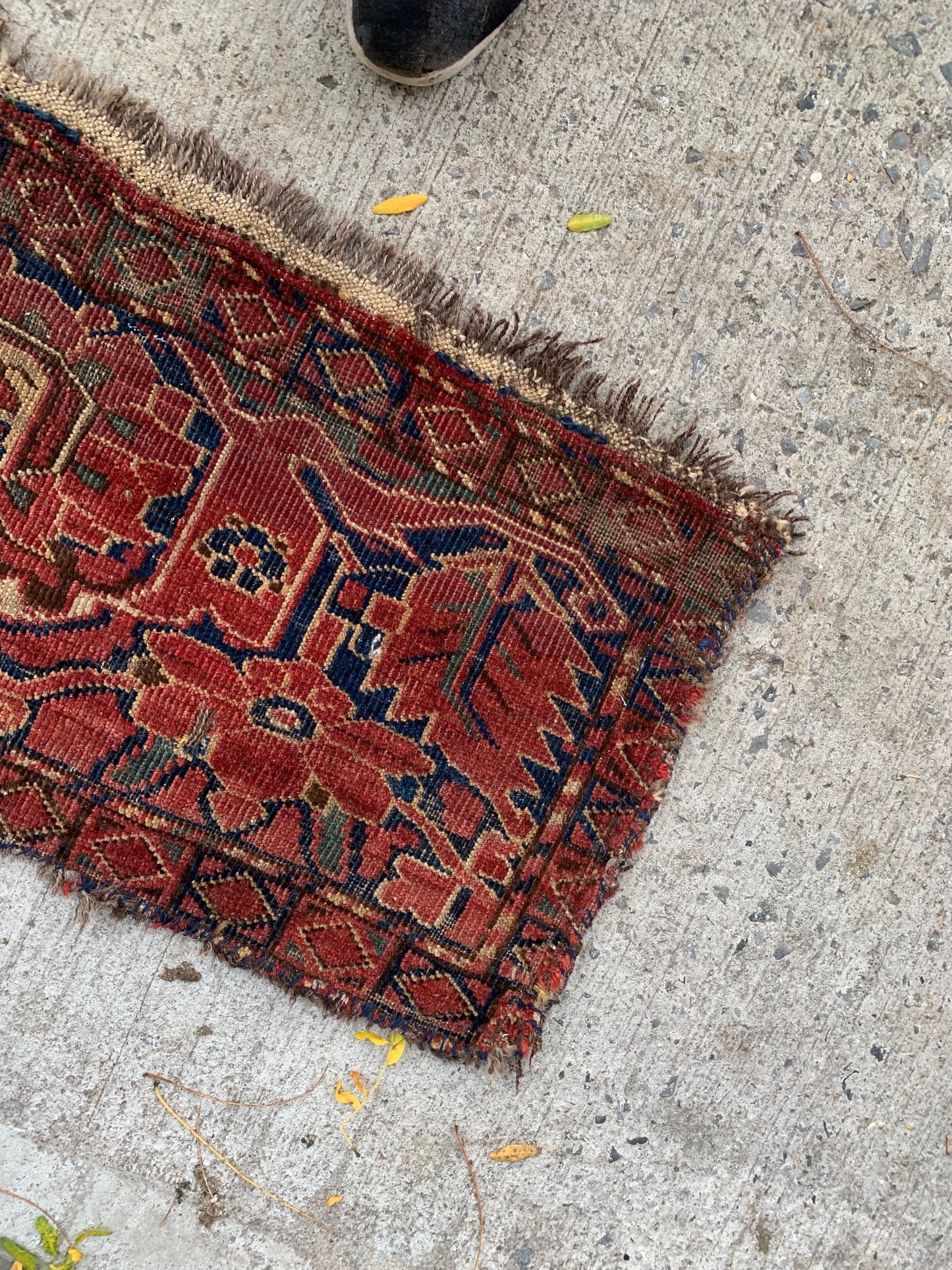 Antique Afghan tribal rug with earthy tones and refined borders.