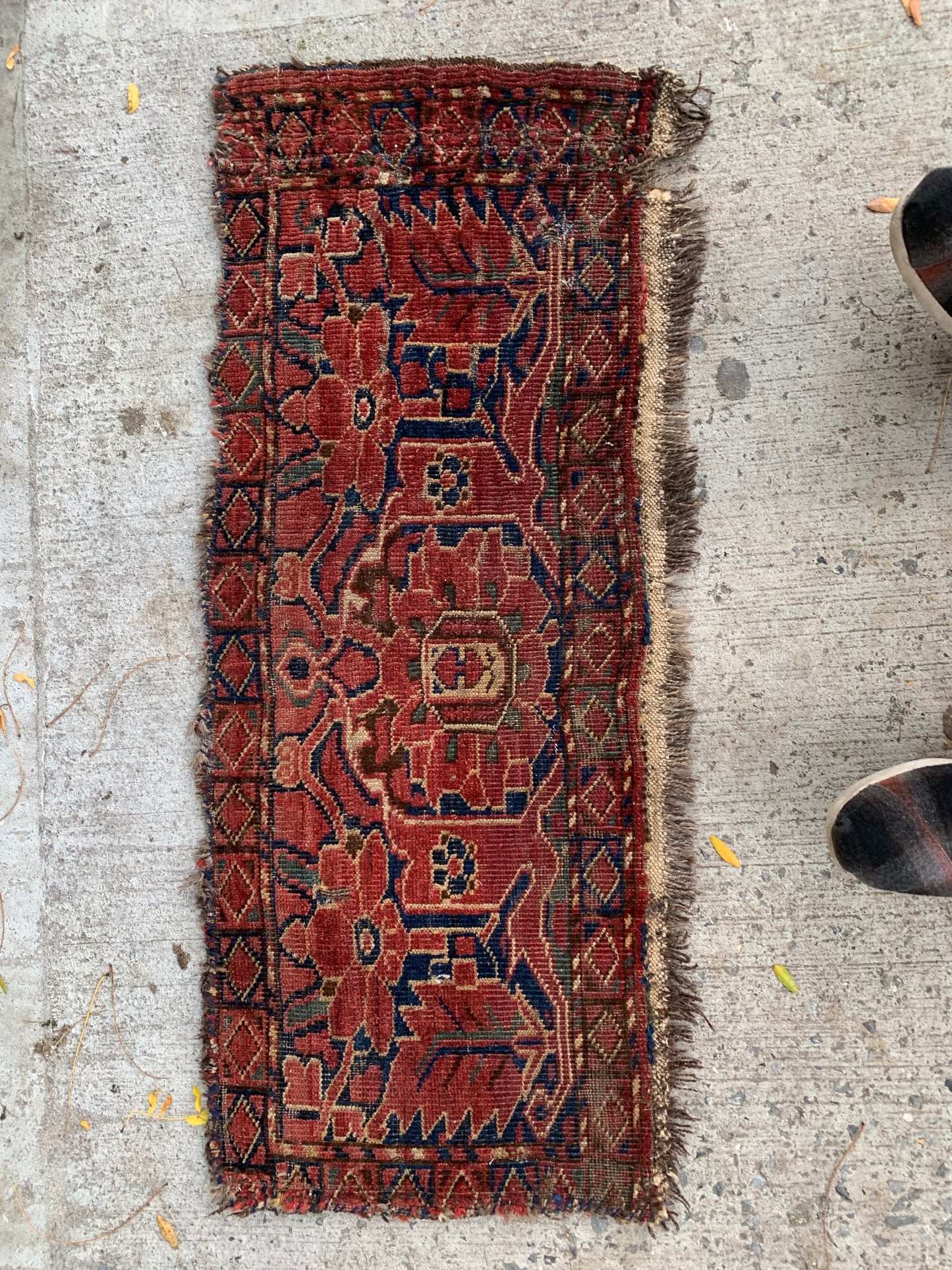Decorative antique Torba rug with traditional Afghan motifs.