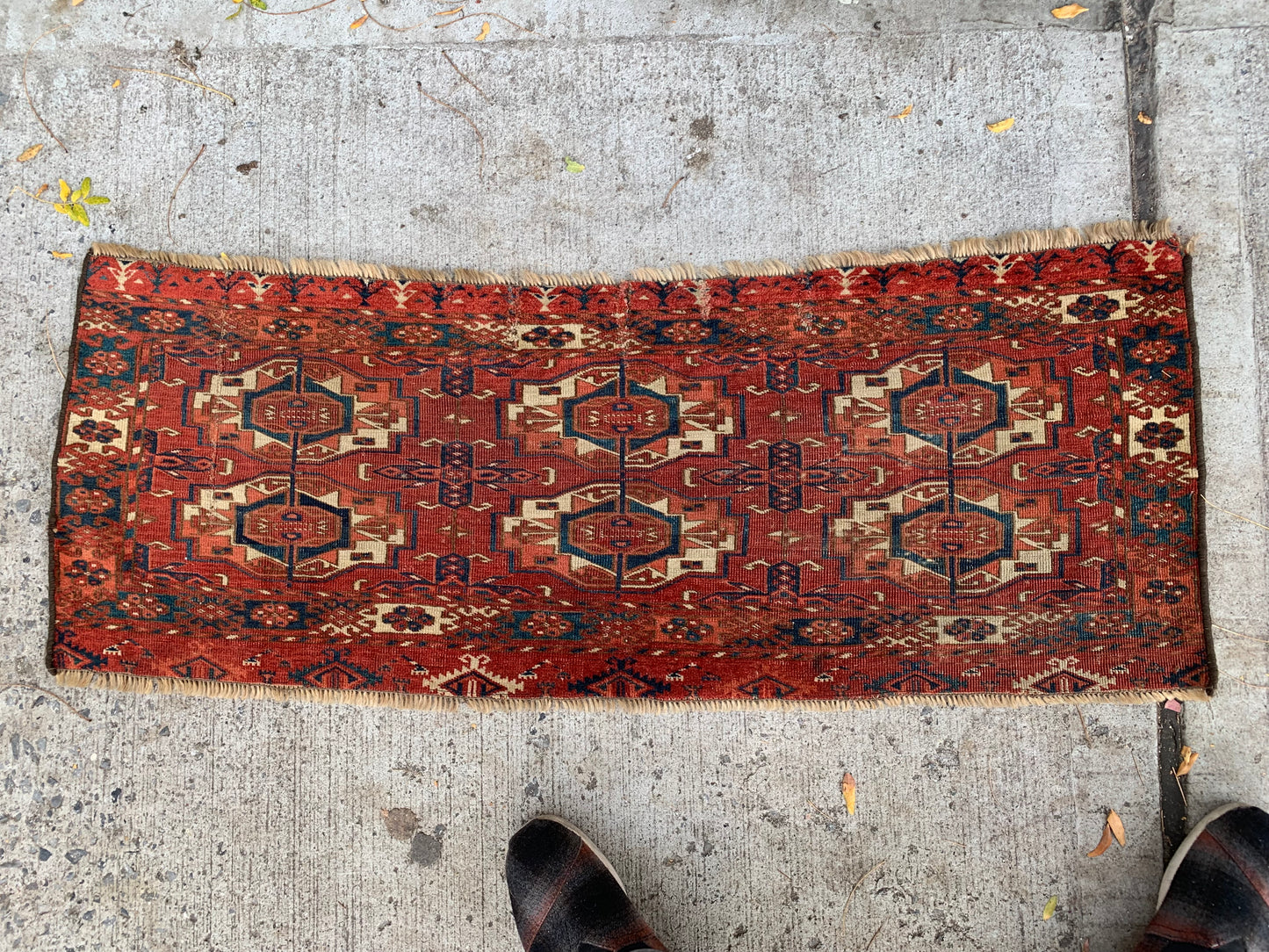 Decorative tribal rug with soft ivory and deep indigo accents.