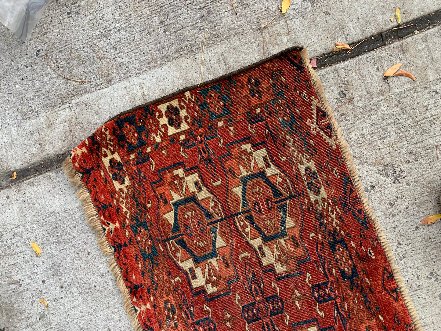 Handwoven wool Torba rug showcasing Tekke artistry.