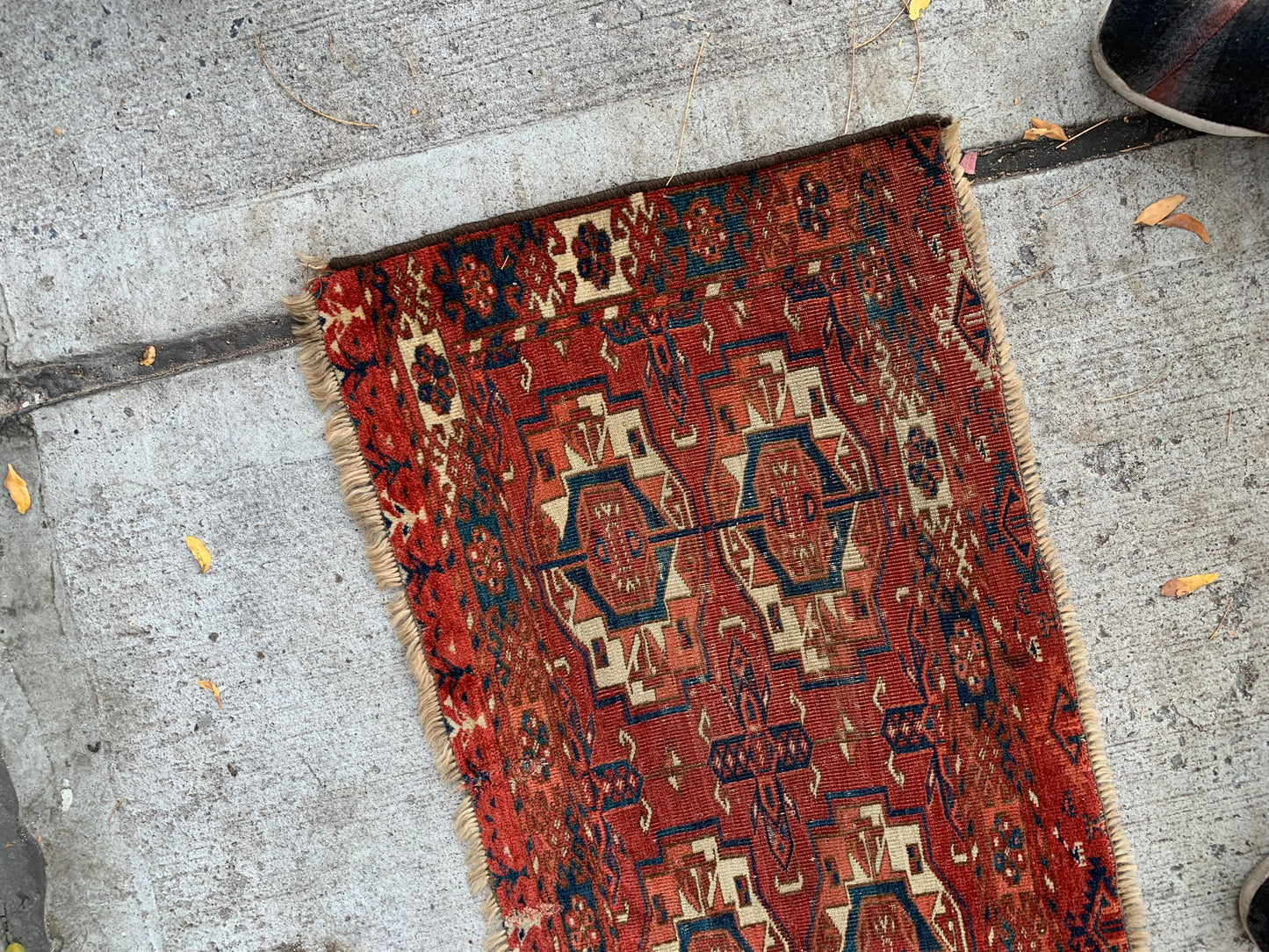 Compact 19th-century Tekke Torba rug for display or decor.