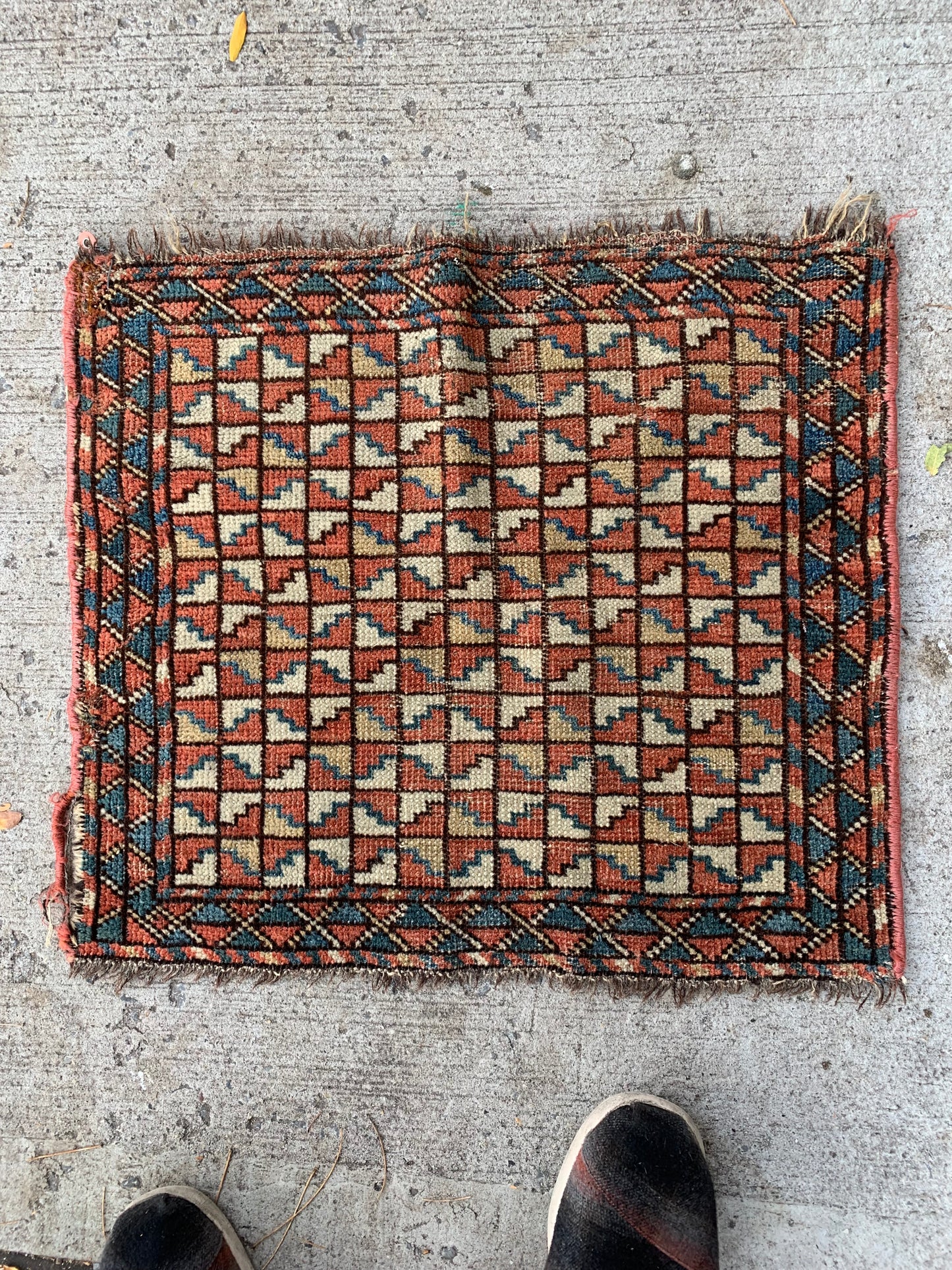 Antique Bashir bagface with a striking multi-layered border.