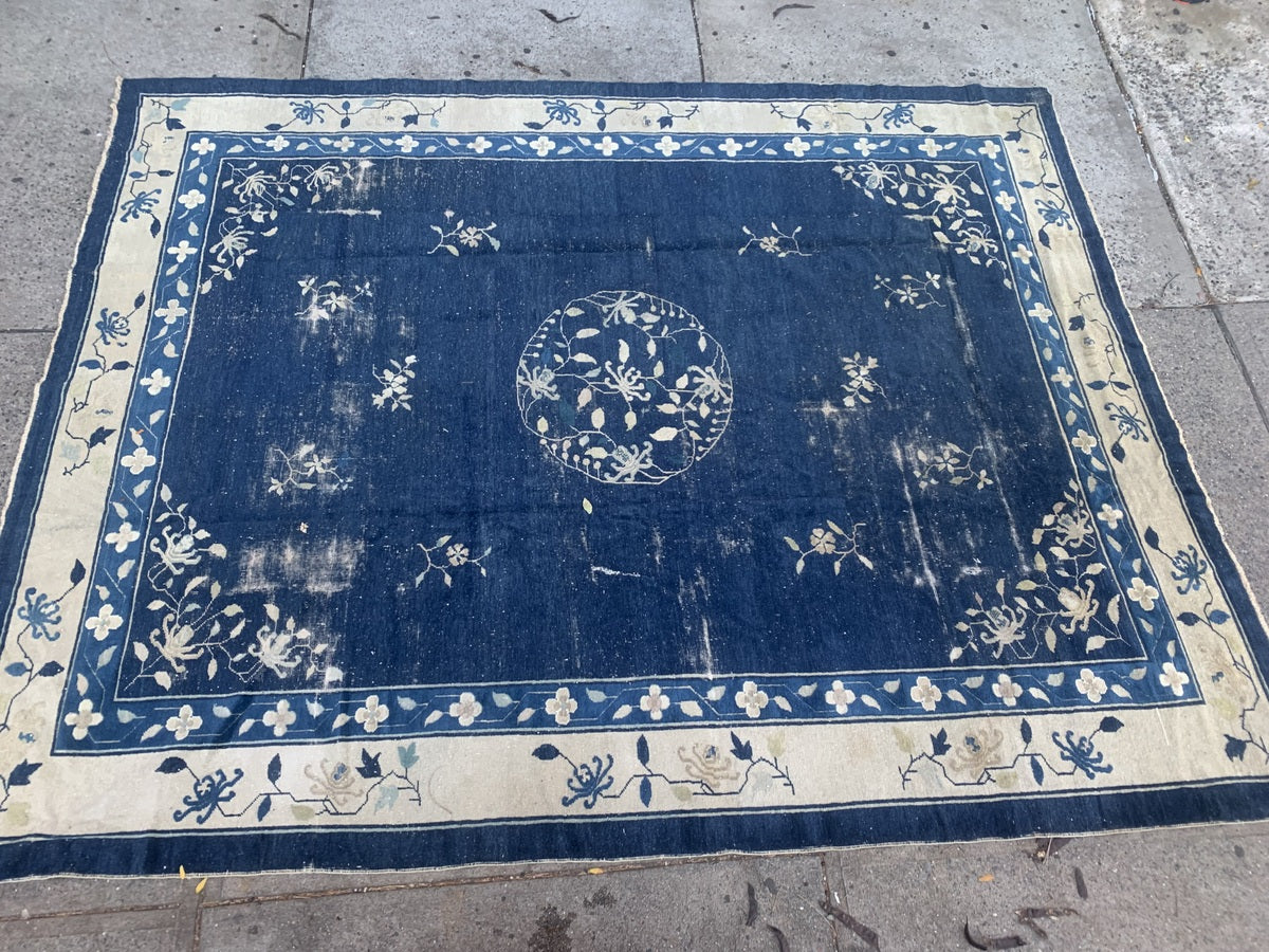 Antique Peking rug with a harmonious blend of colors and patterns.