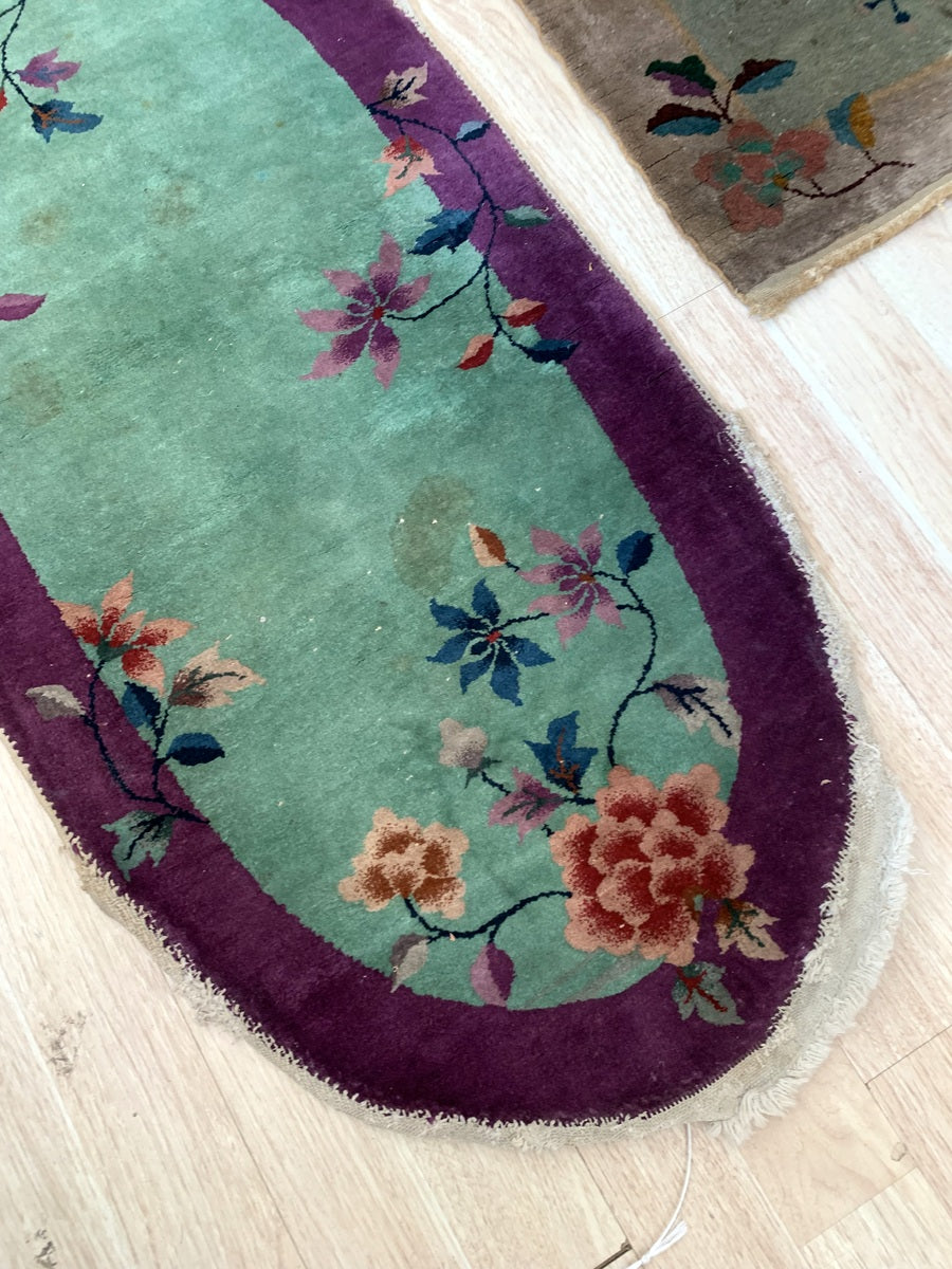 Unique oval-shaped Chinese Art Deco rug from the 1920s.