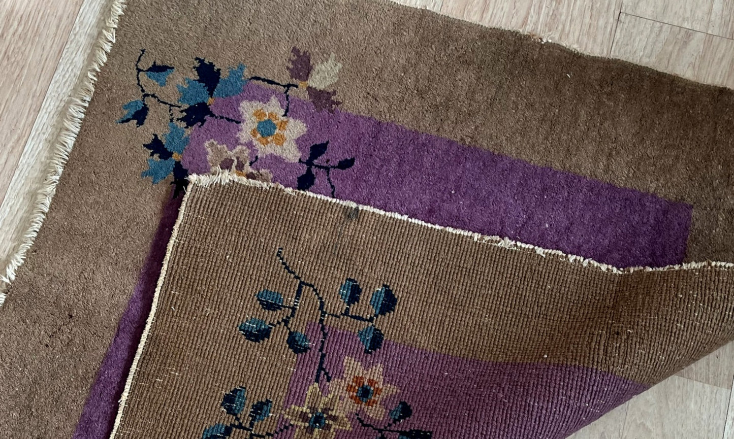 Close-up of delicate floral details in soft yellow, deep blue, and ivory