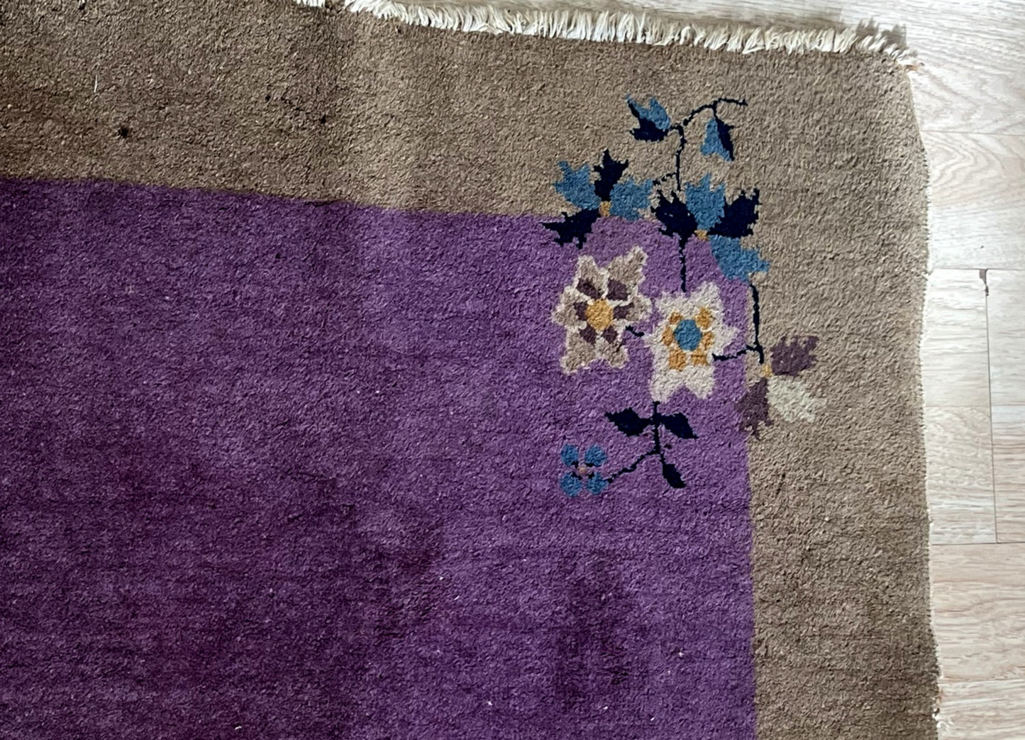 Finely knotted wool surface highlighting its handmade quality