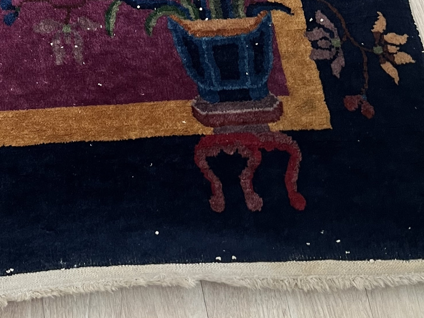 Fringed edges of the 1920s Art Deco Chinese rug