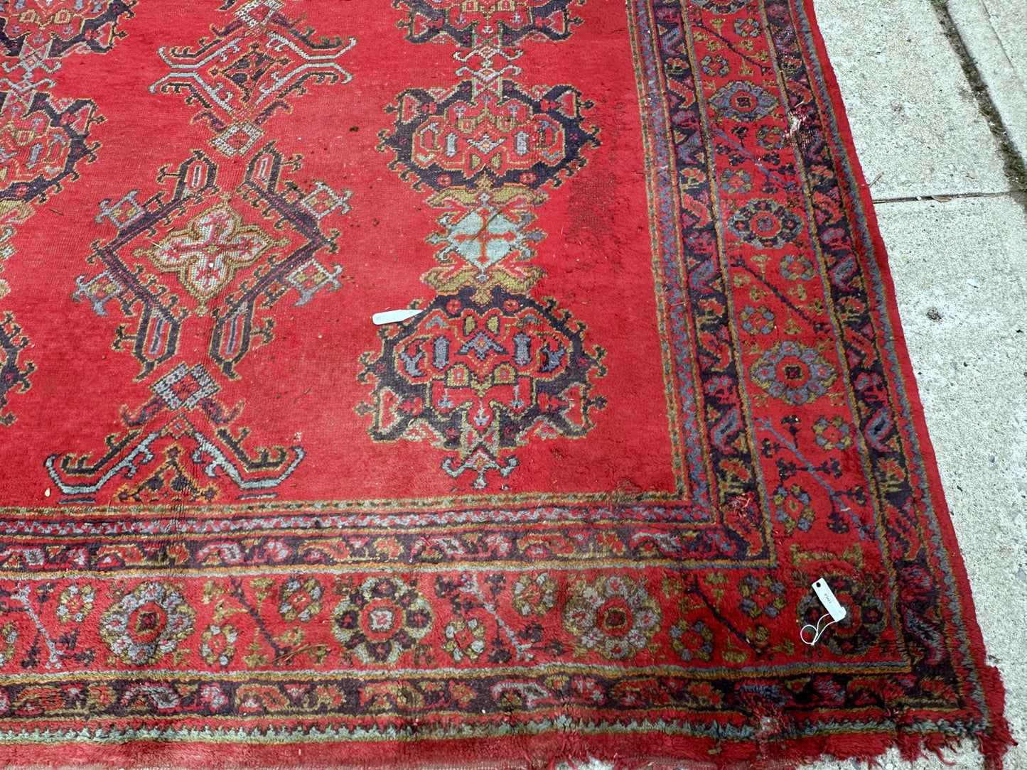 Handwoven Turkish rug with visible signs of vintage charm
