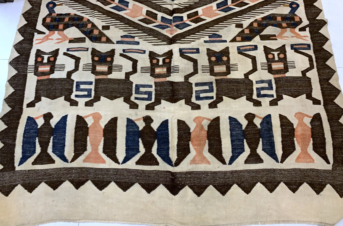 Full view of the 5.5' x 7' antique Kilim rug