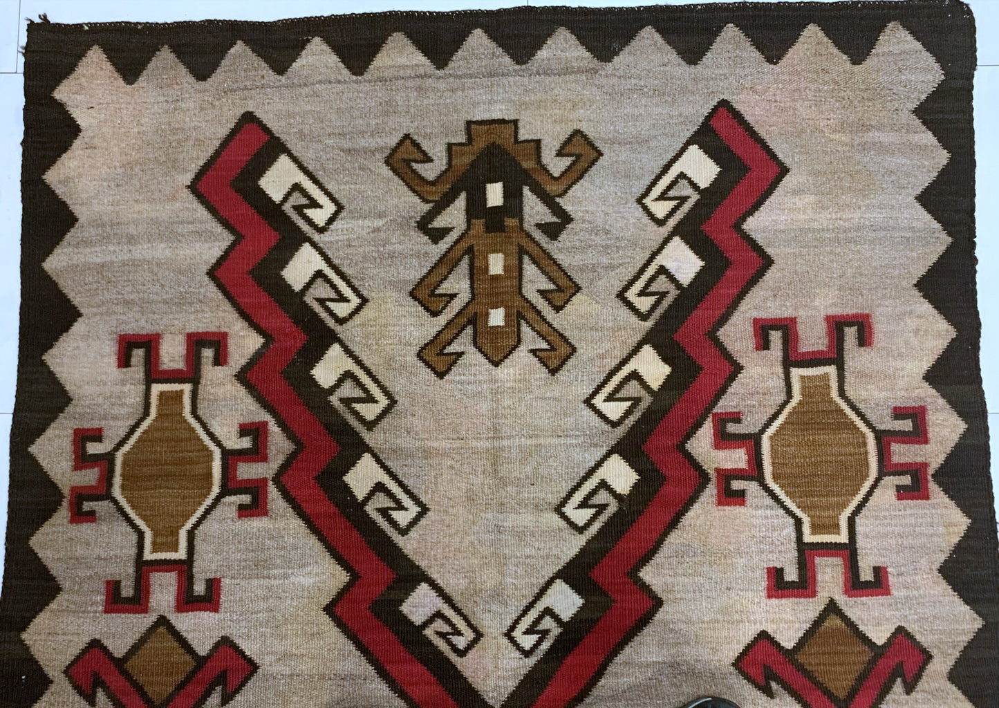 Classic Navajo textile with diamond and zigzag motifs