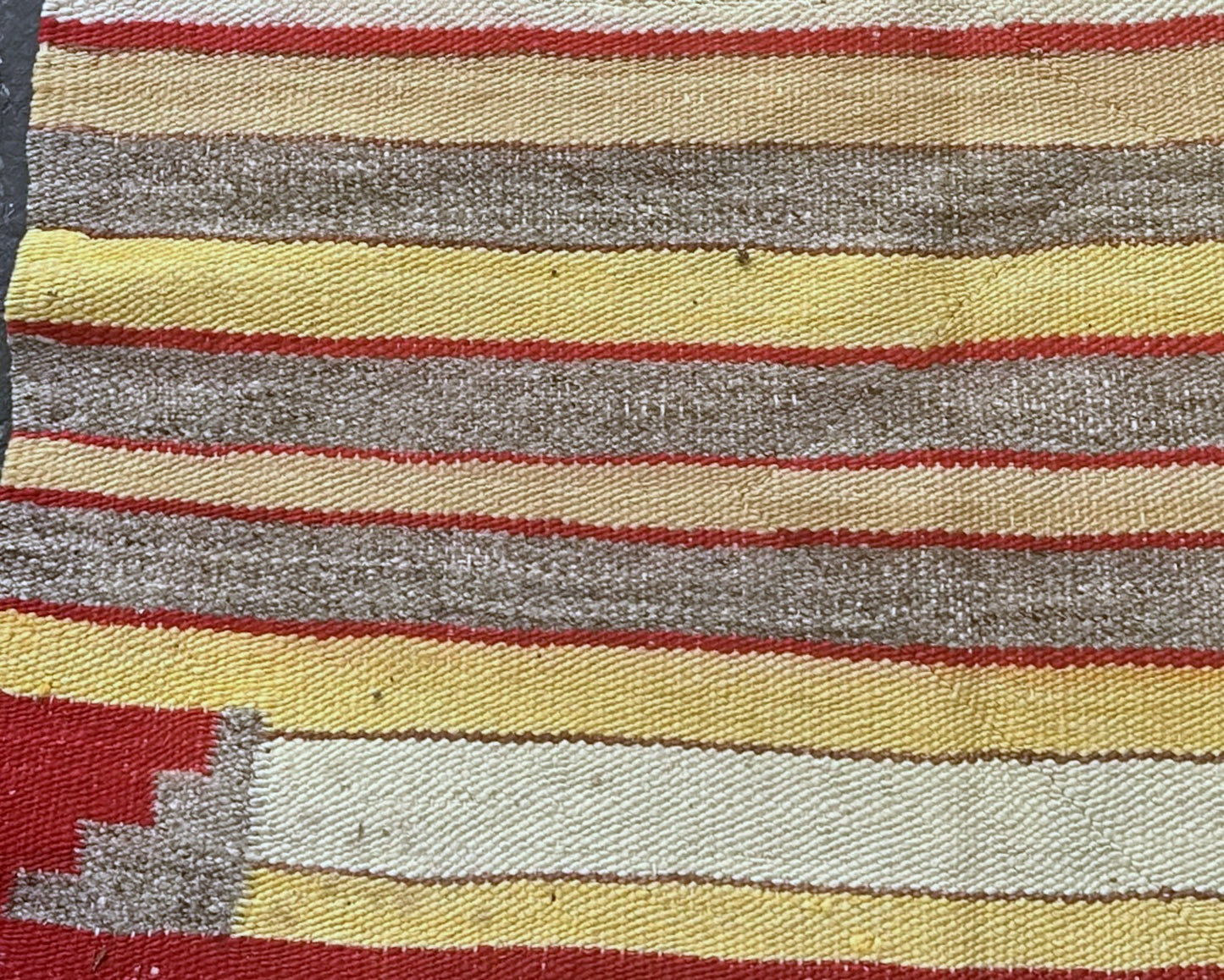 Side view showcasing the texture of handwoven Navajo wool