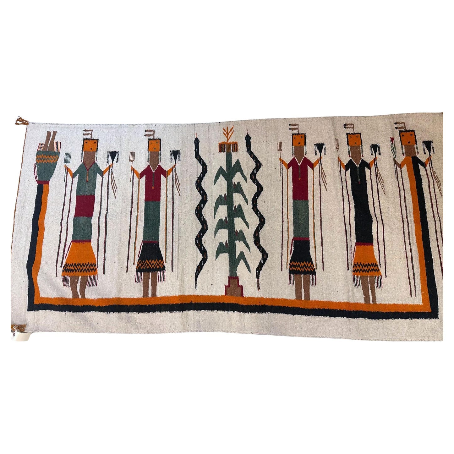 Textile with decorative pattern of figures and a central design on a white background