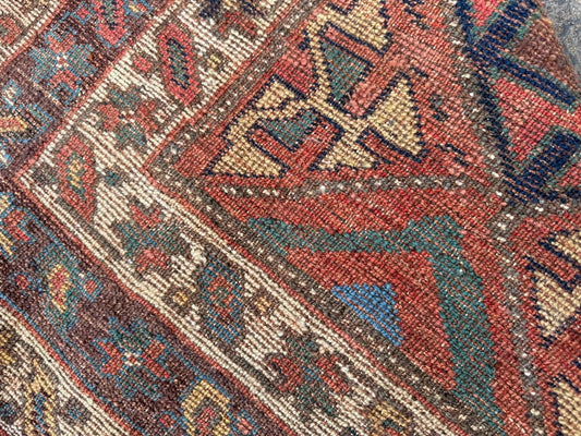 Close-up of geometric pattern on swampy green field