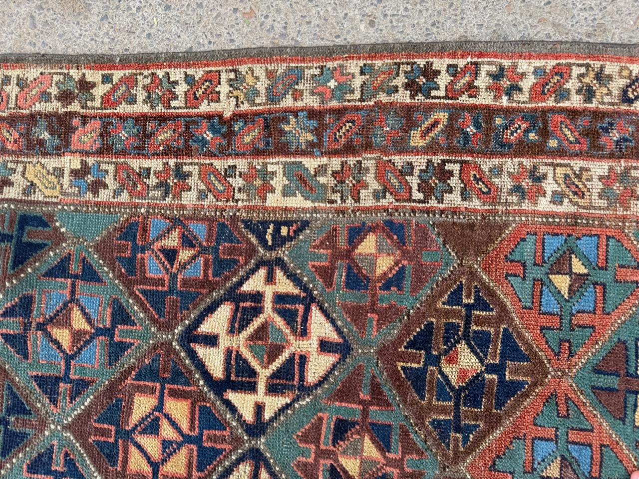 Edge detail with neat binding and worn character