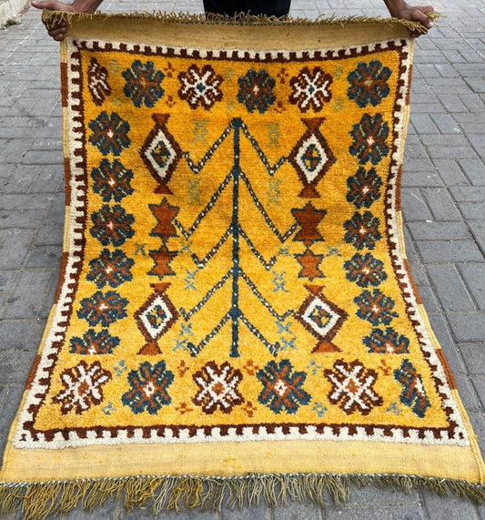 Close-up of the abstract Tree of Life motif in indigo blue.