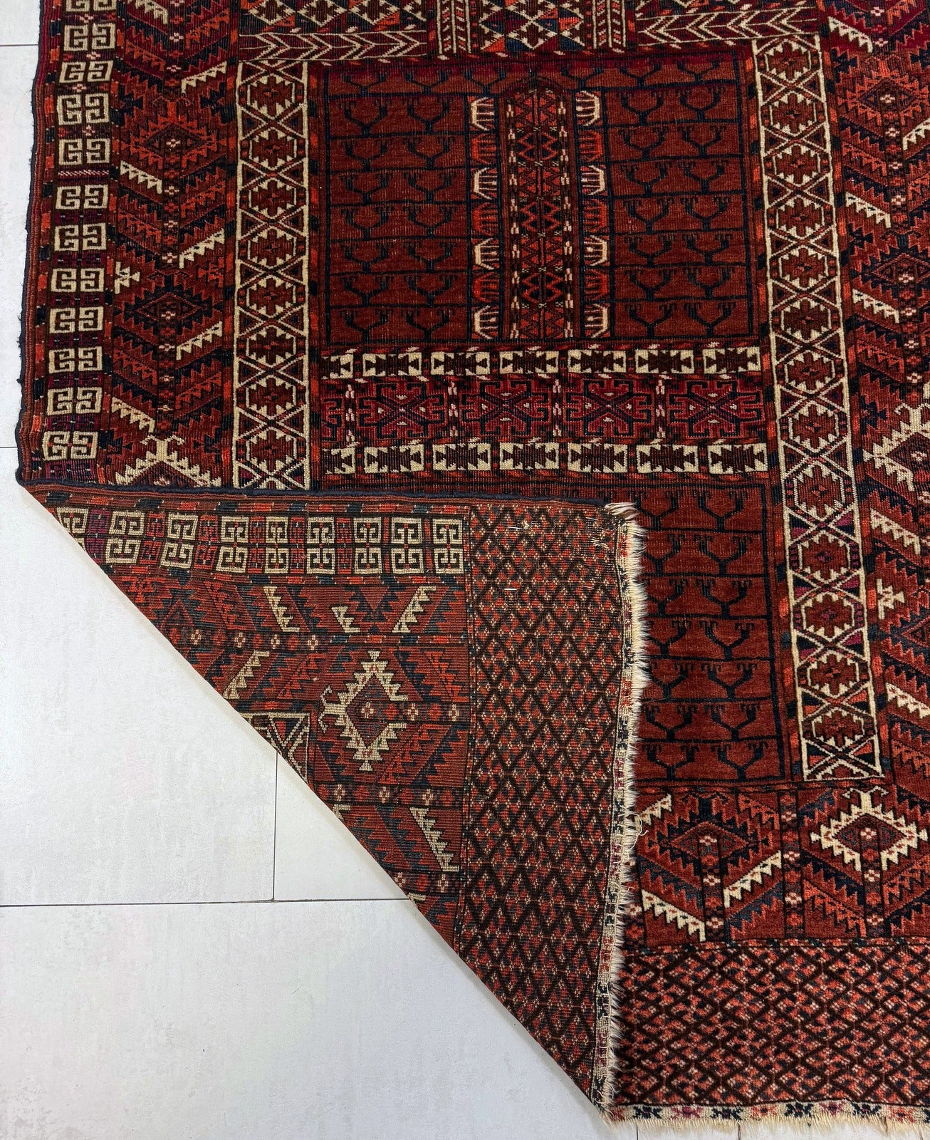 Close-up detail of the central cross and the geometric dividing lines.