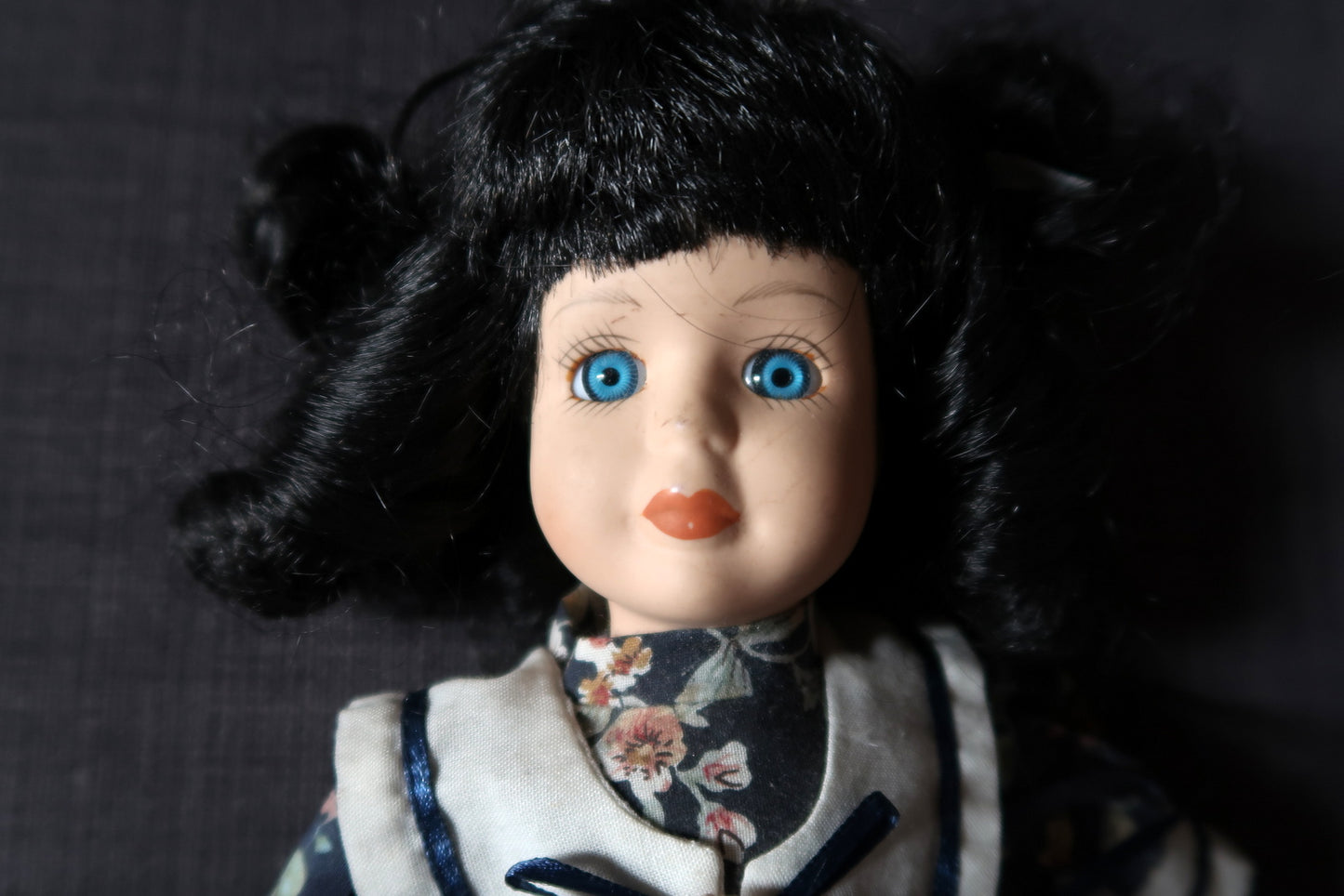 Elegant vintage porcelain doll from the mid-20th century