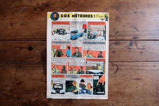 Back cover page featuring serialized S.O.S. Météores comic strip by Edgar P. Jacobs