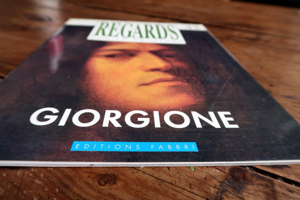 Opening Giorgione spread with publication information and an illustrated introductory page.