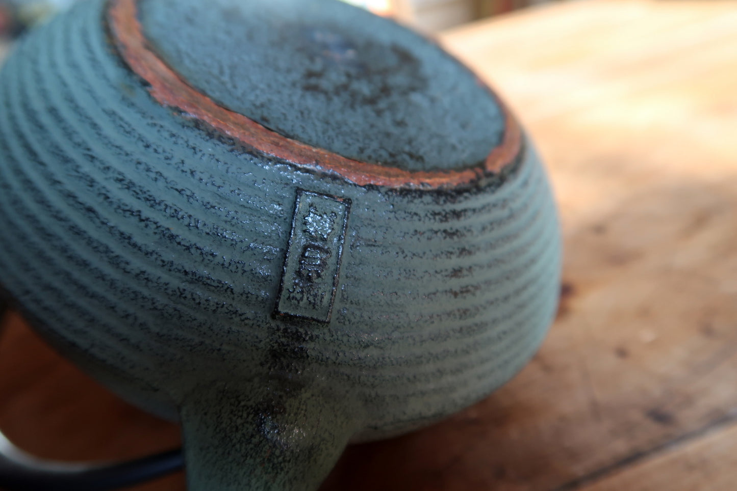 Japanese minimalist teapot, cast iron construction with elegant simplicity