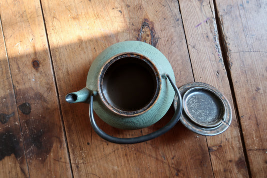 Green cast iron teapot, vintage tetsubin style with simple modern form
