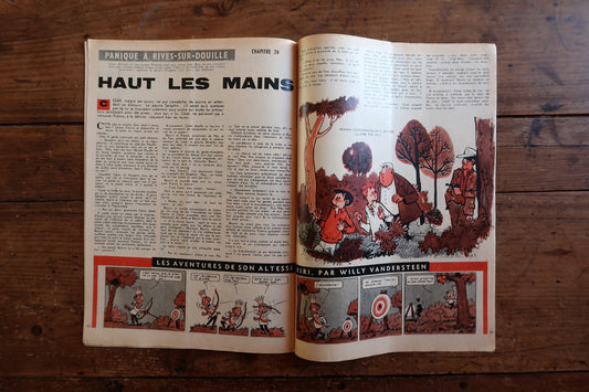 Close-up of the cover art on a 1959 French Tintin comic book magazine showing a detailed street scene illustration, the issue number, date, and Hergé's classic artwork.