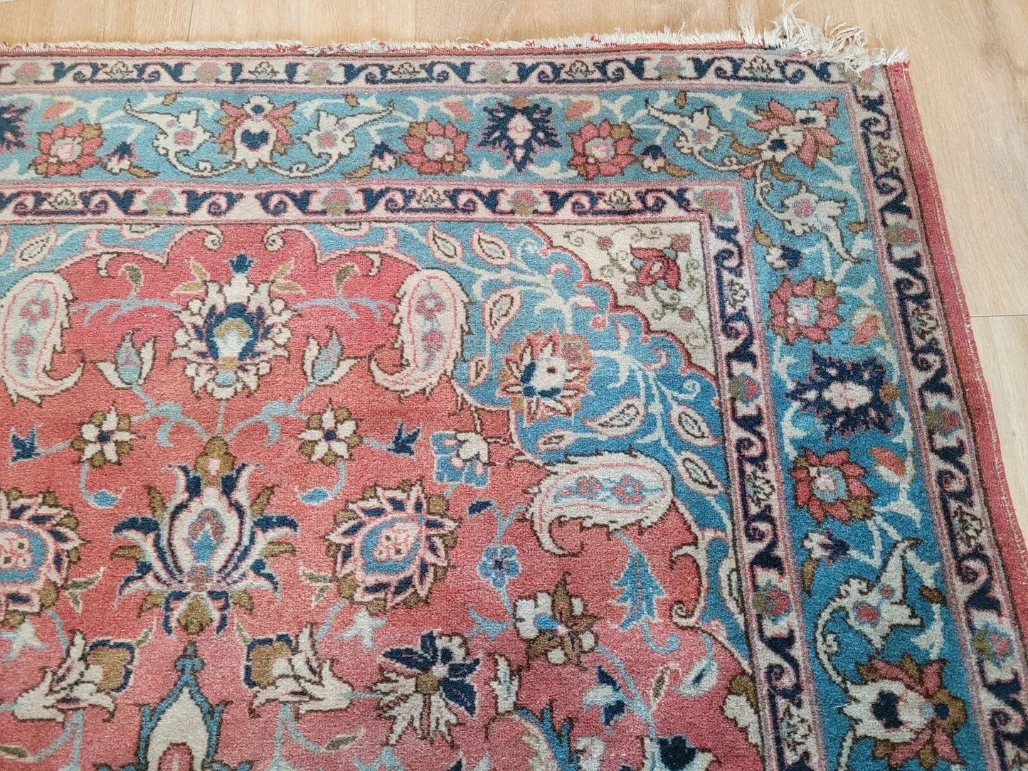 High-quality antique Persian rug showcasing fine wool craftsmanship