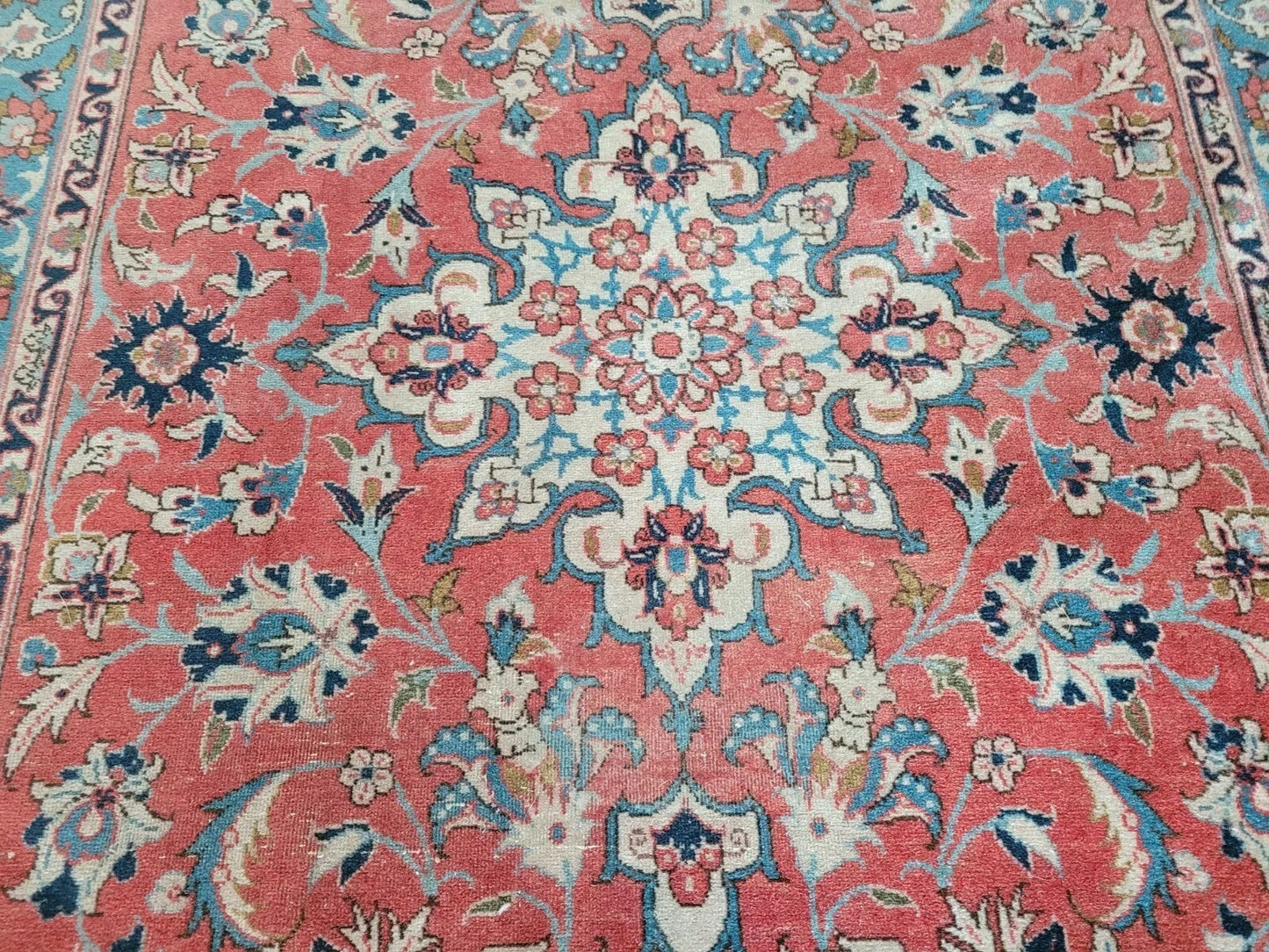 Persian wool rug with delicate ivory and earth-toned detailing