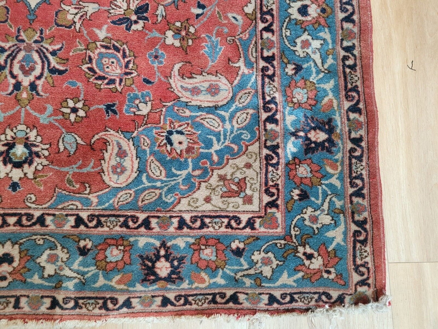 Hand-knotted Persian rug with intricate symmetrical motifs