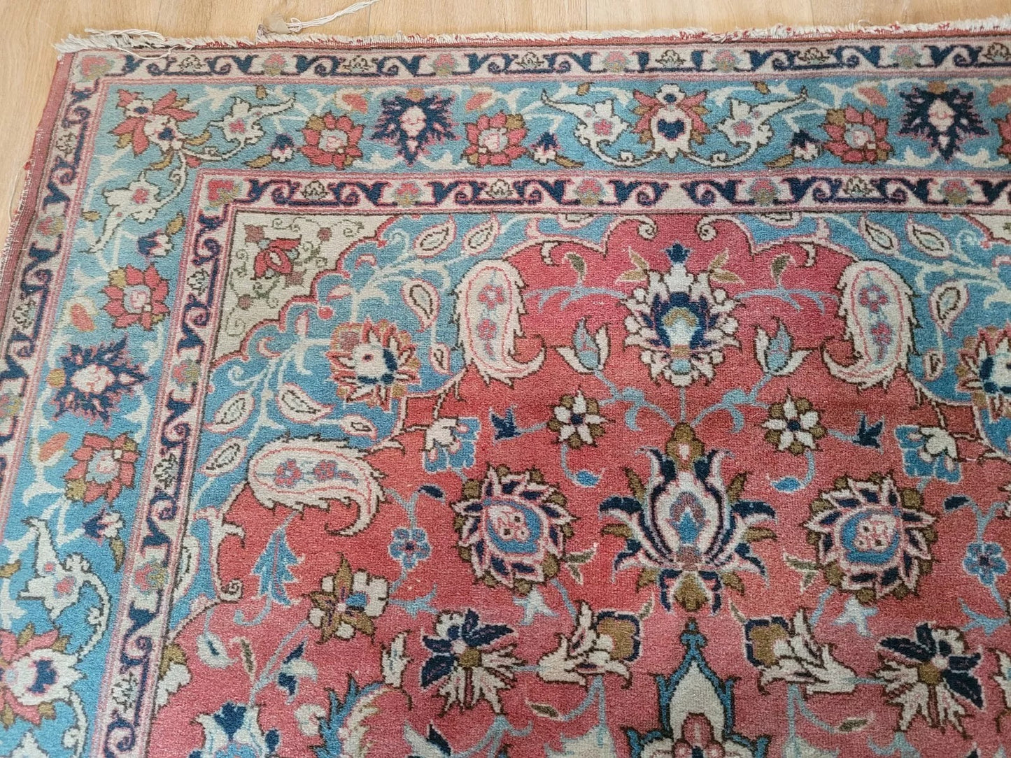 Antique Persian rug with stunning floral arrangements and medallion