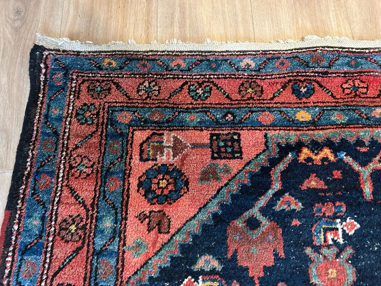 High-quality antique Persian rug showcasing fine wool craftsmanship