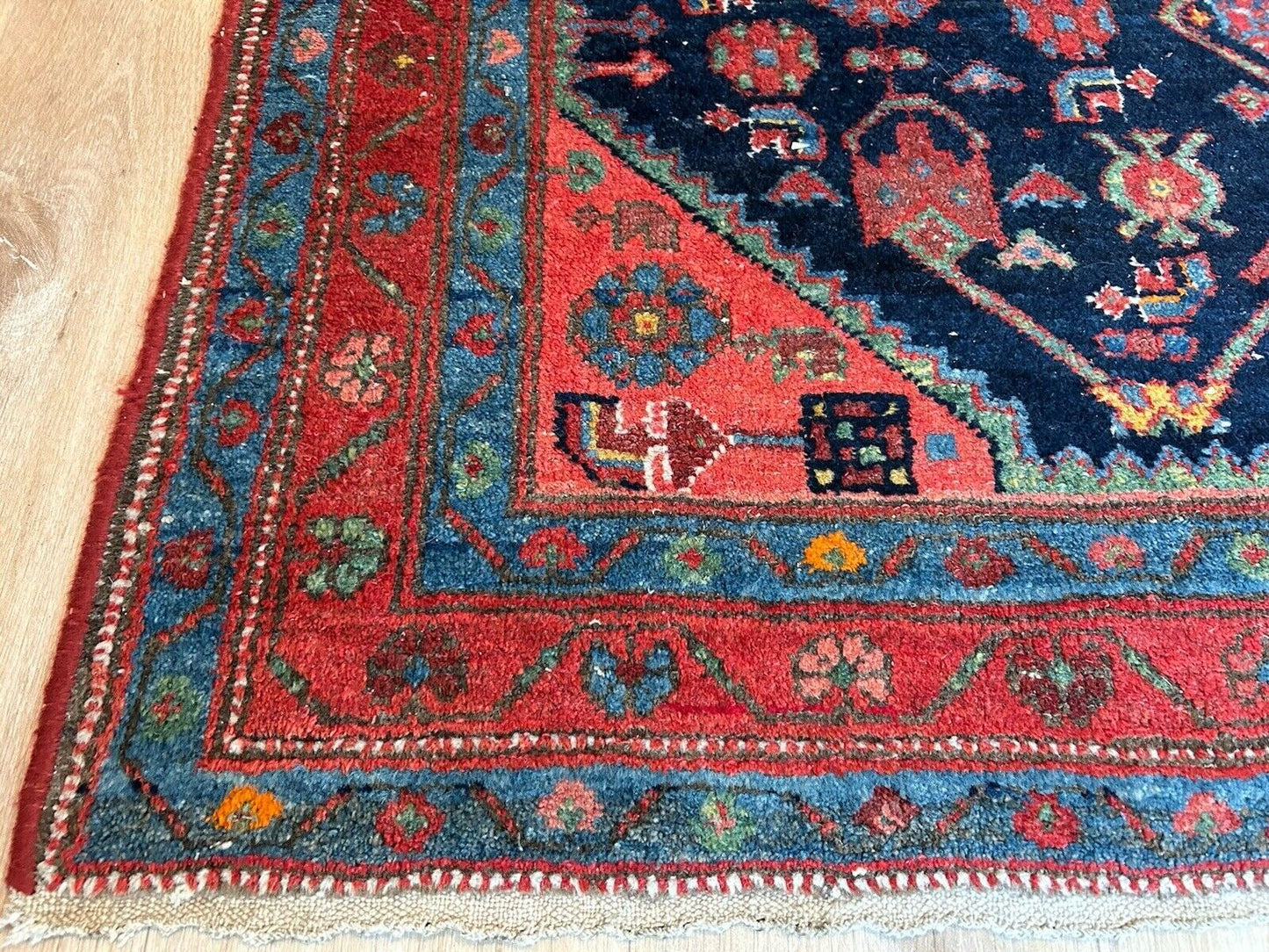 Persian wool rug with delicate ivory and earthy-toned detailing