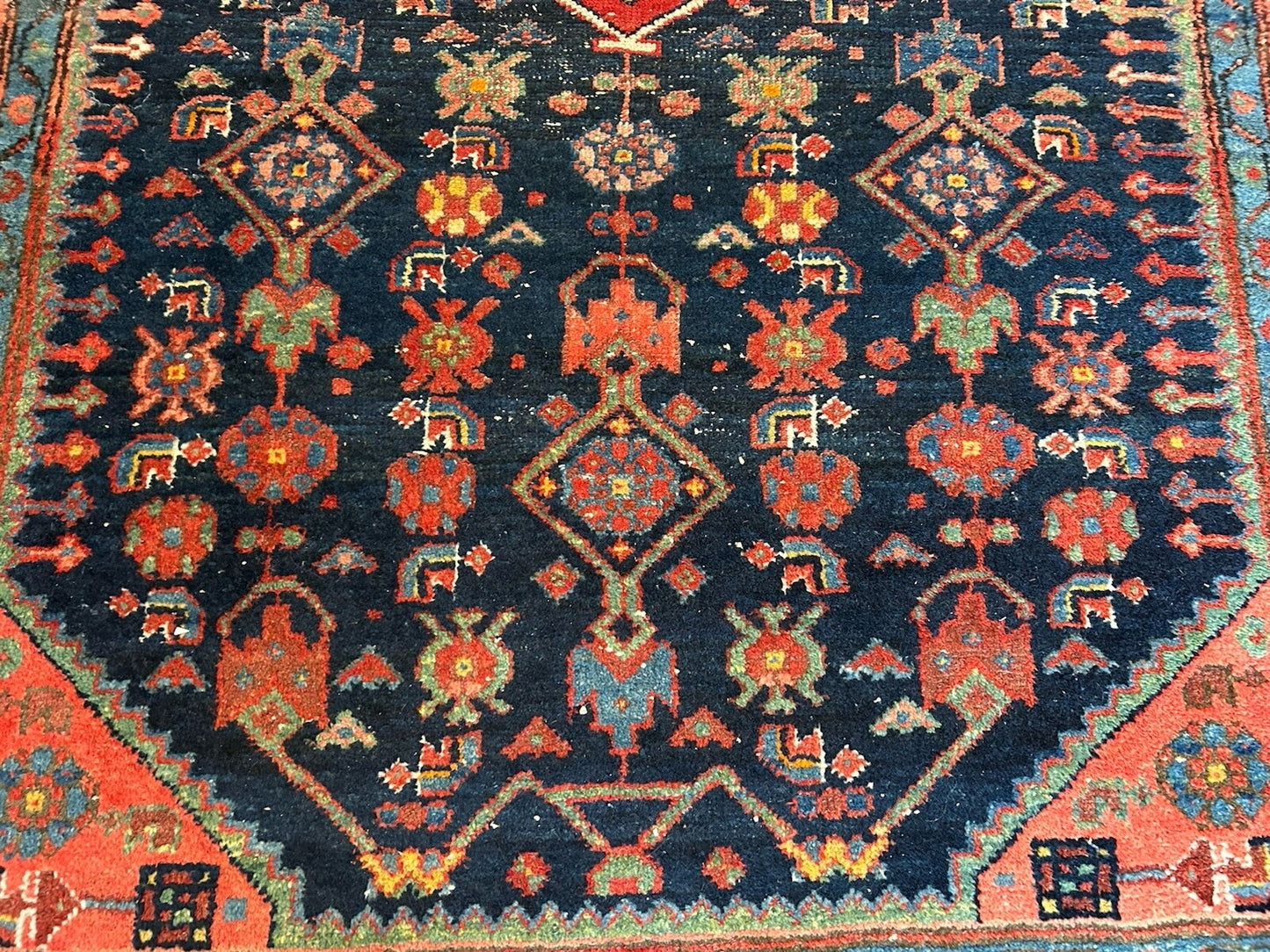 Persian Hamadan rug displaying a harmonious blend of warm colors